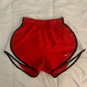Red Nike shorts